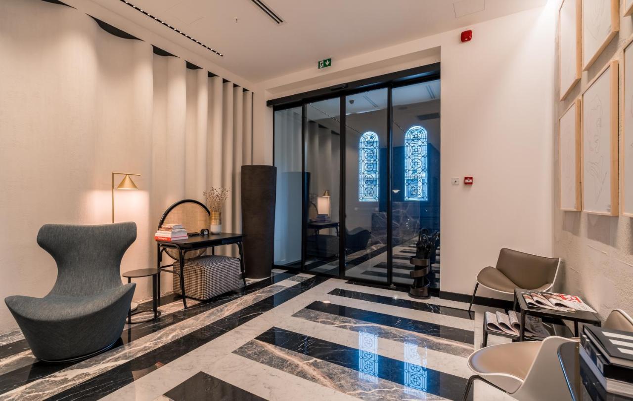 Monograph Freedom Square Hotel Tbiliszi Kültér fotó The lobby of the hotel